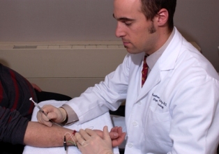 Picture of physician treating patient