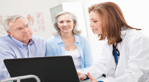 Photo of a man and a woman with a doctor